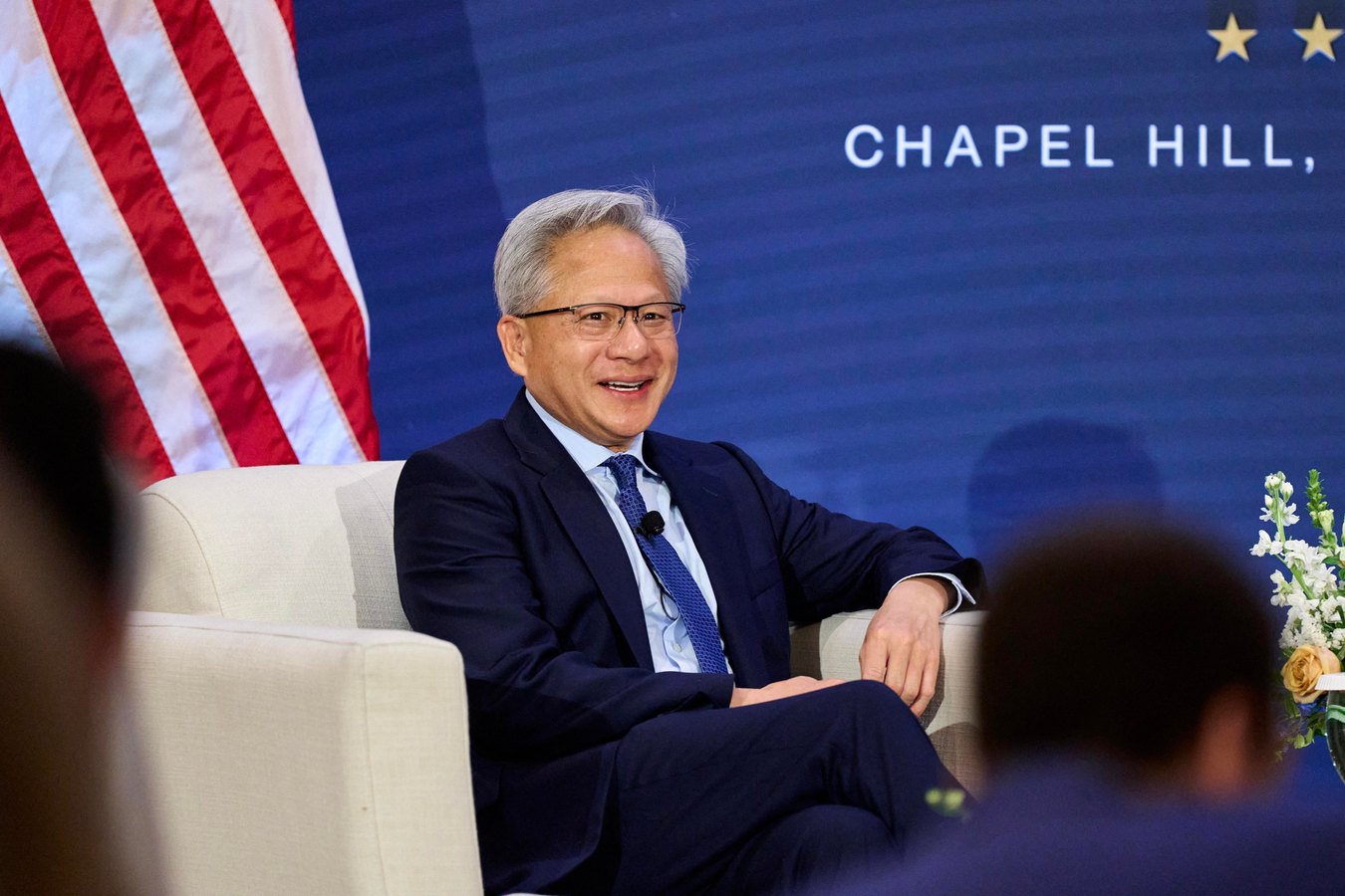 Jensen Huang puts Trump on speakerphone onstage to announce robots won’t